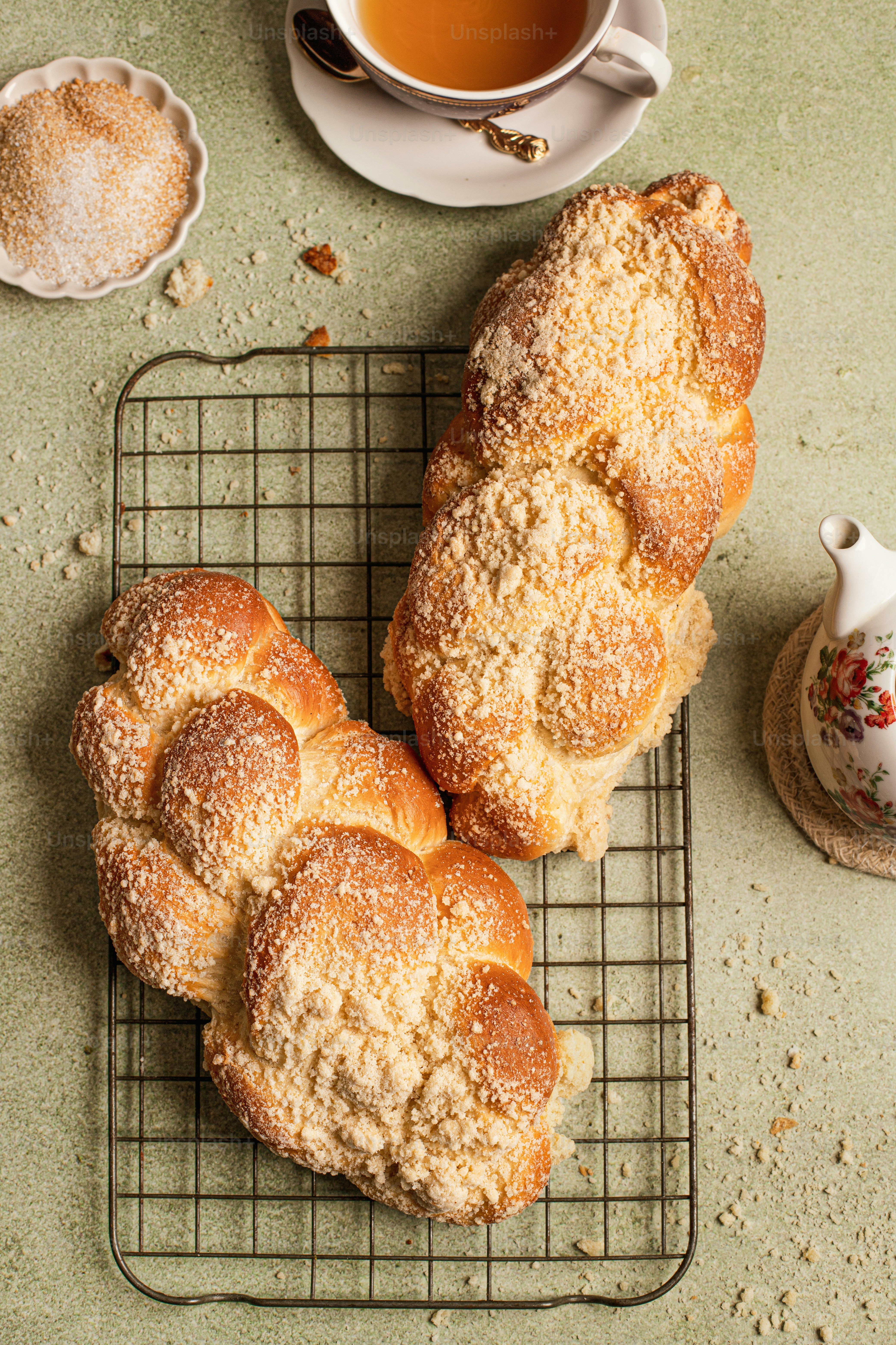 a couple of loaves of bread on a cooling rack