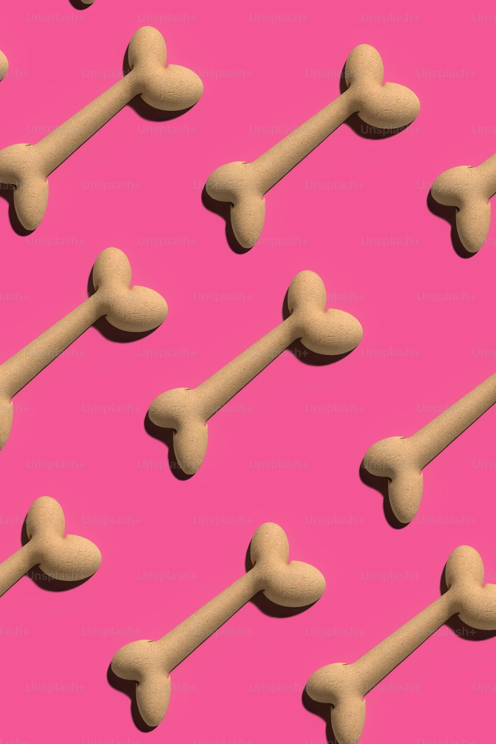 a pink background with a bunch of bone bones