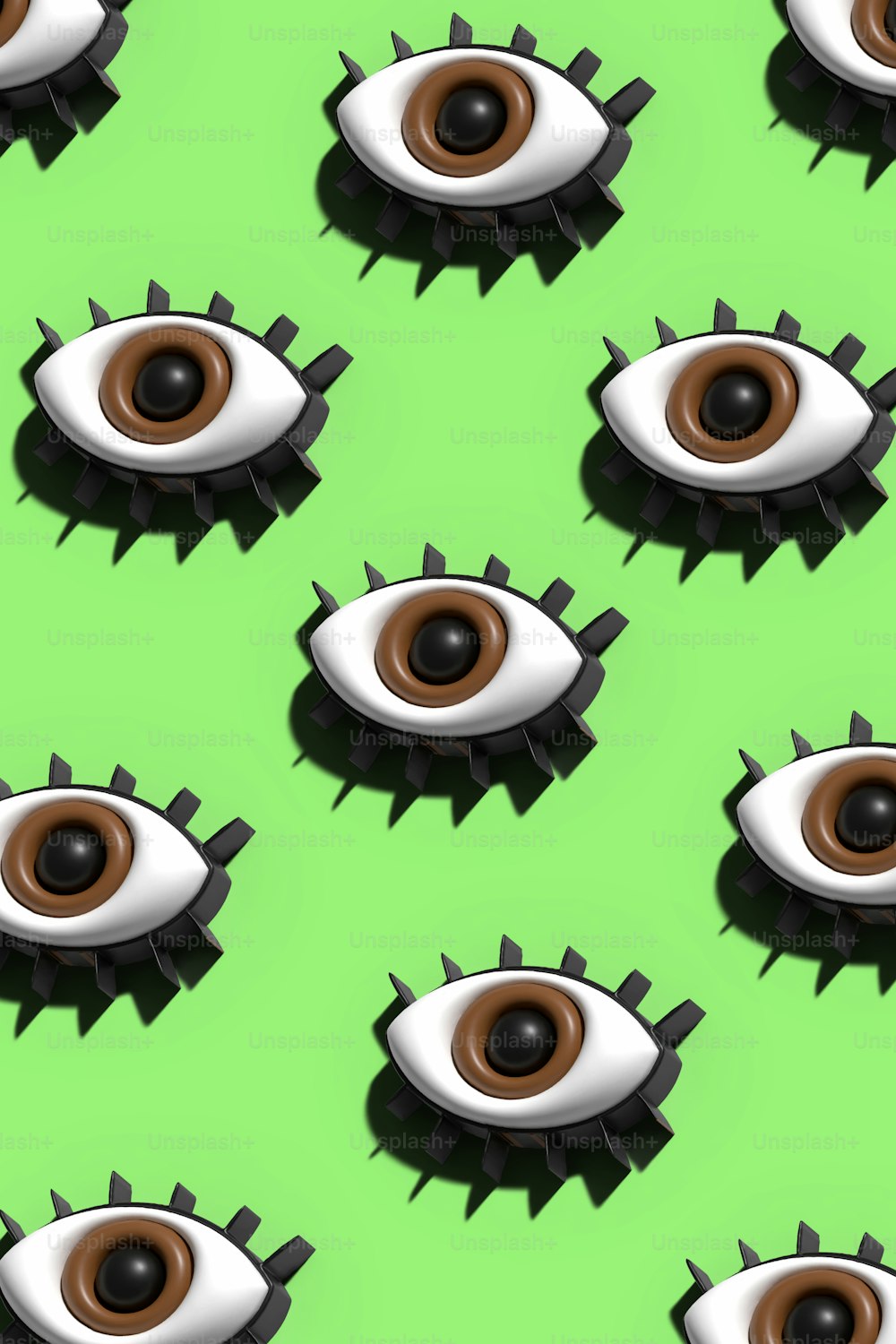 緑の背景にたくさんの偽の眼球