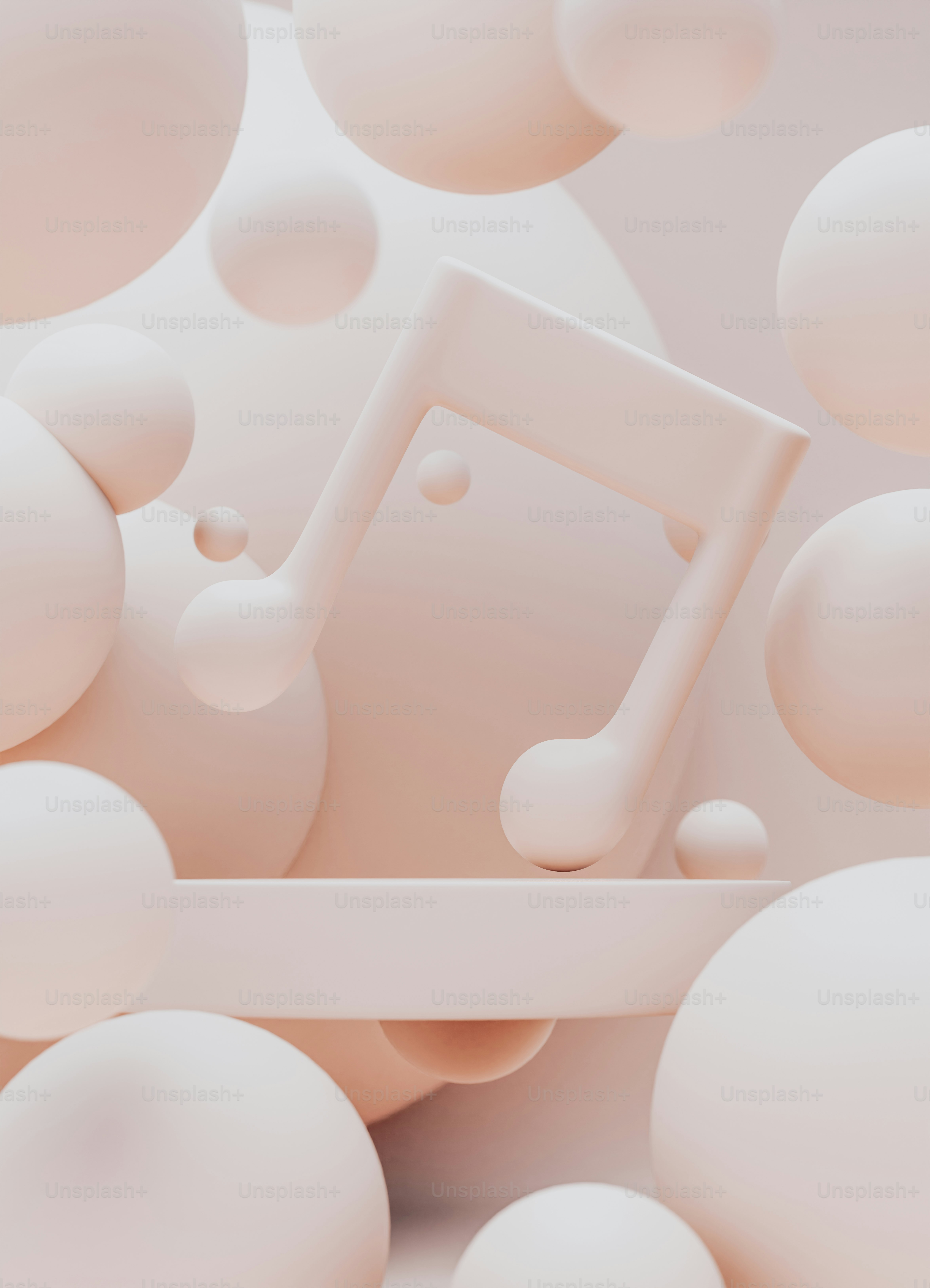 a group of white balls floating around a white object