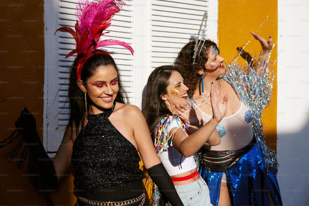 a group of women standing next to each other