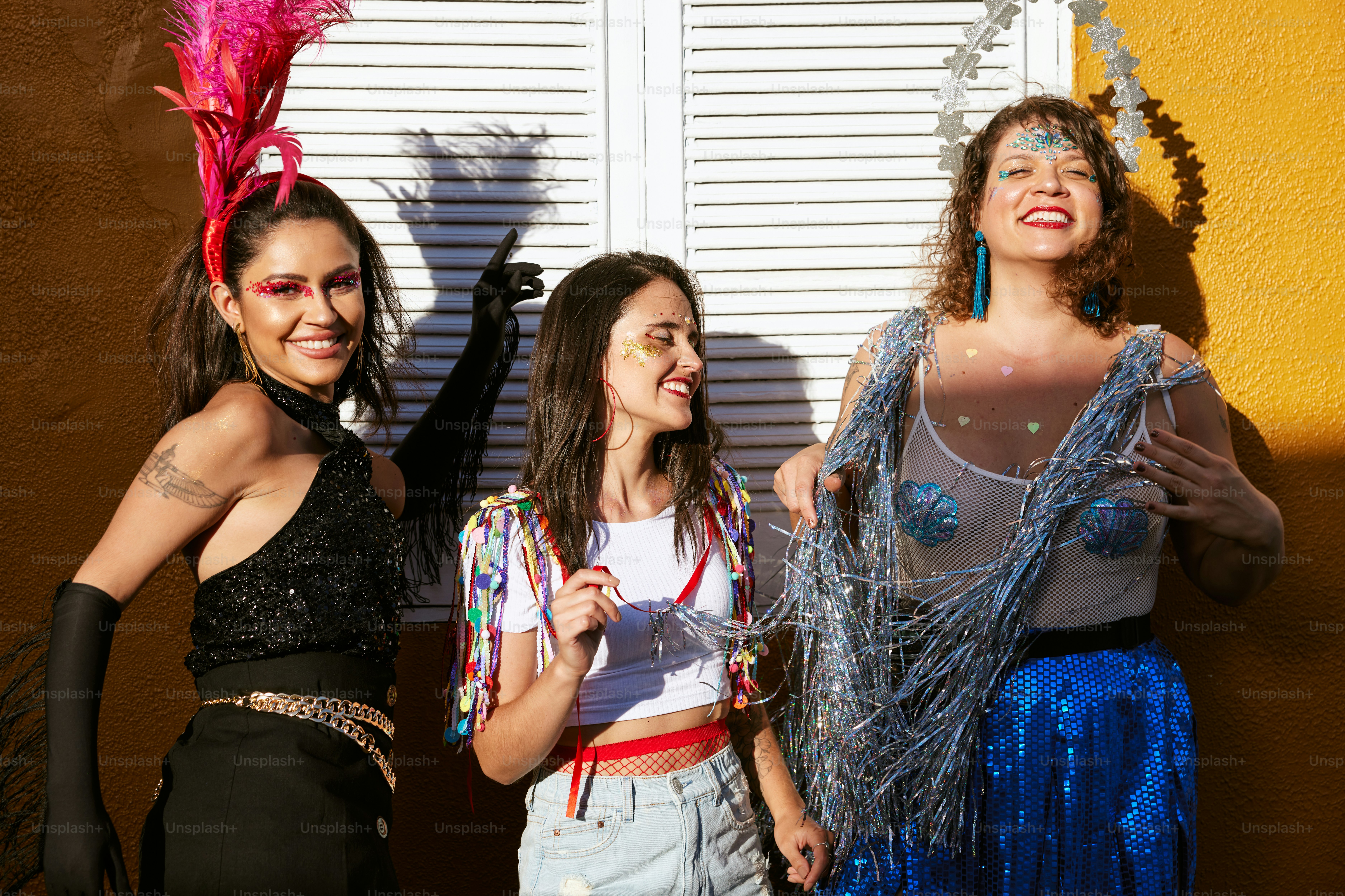Group wearing coordinated festival fashion with matching accessories and colorful rave styling