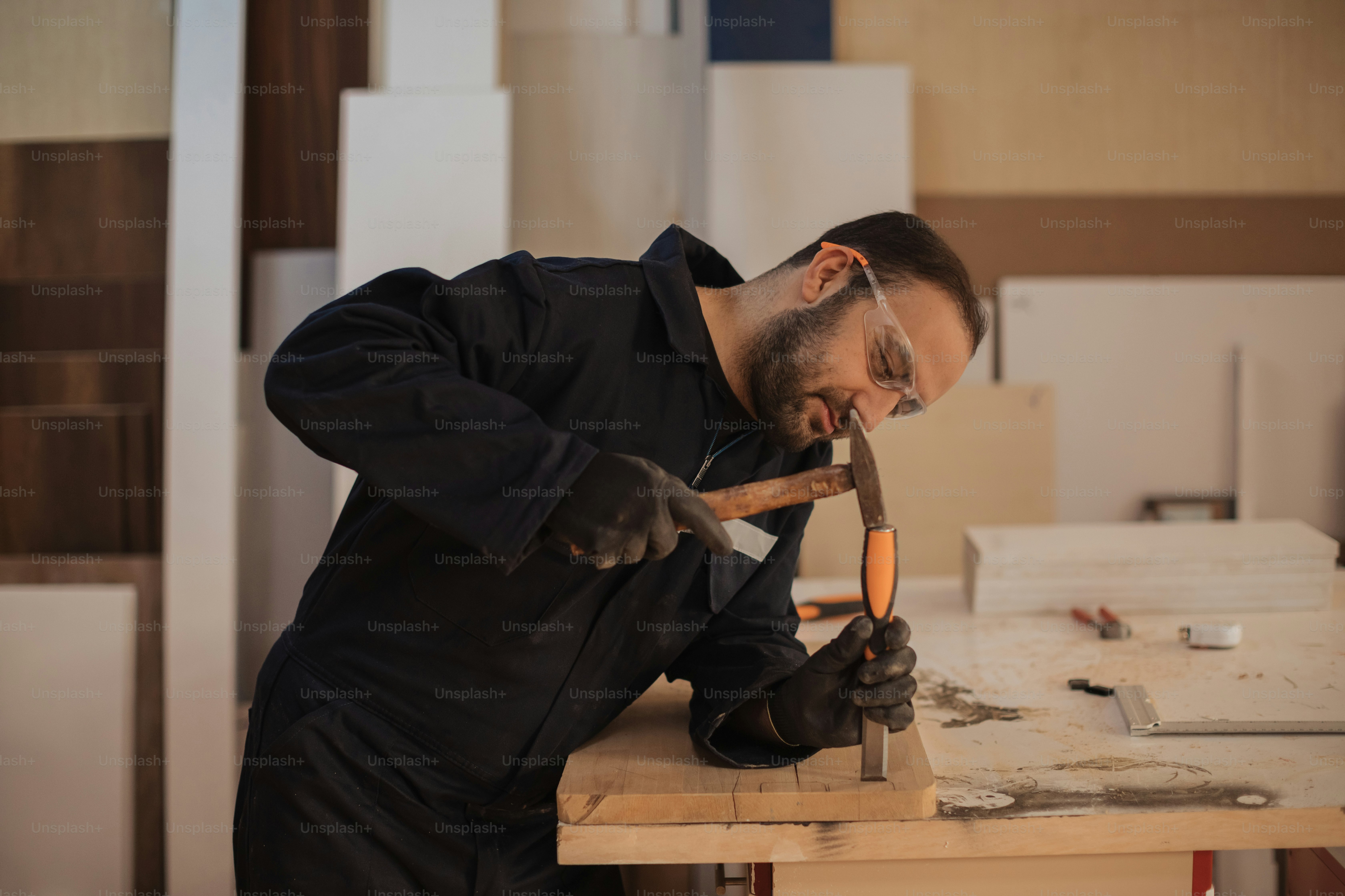 a man working on a piece of wood