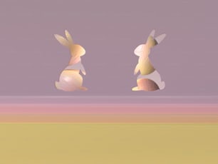 Un par de conejos sentados uno al lado del otro