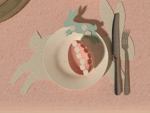 a plate with an egg and fork on a table