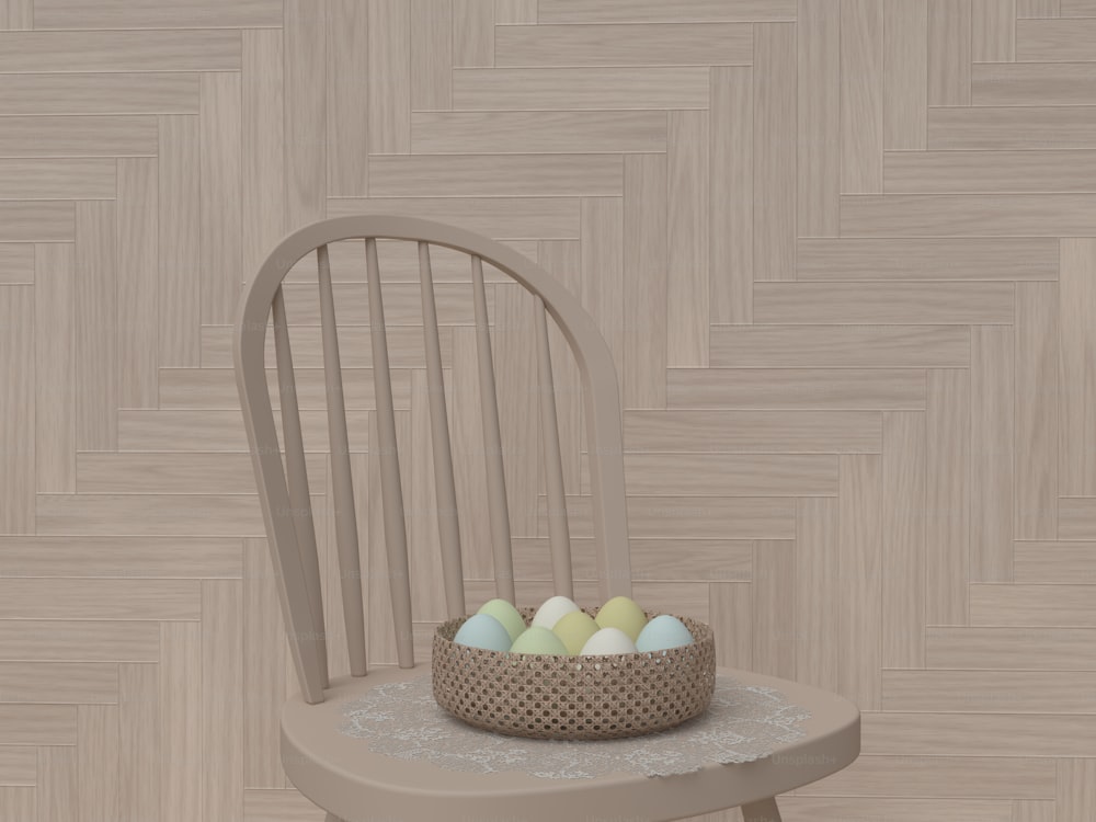a basket of eggs sitting on a chair