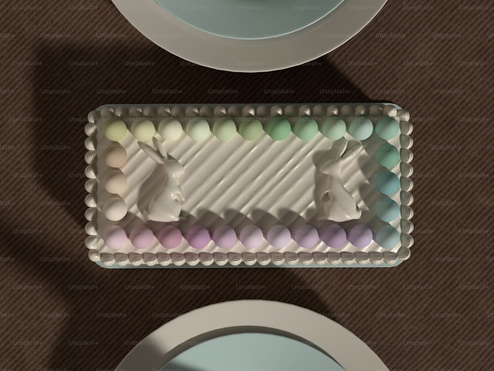 a table with plates and a tray of eggs