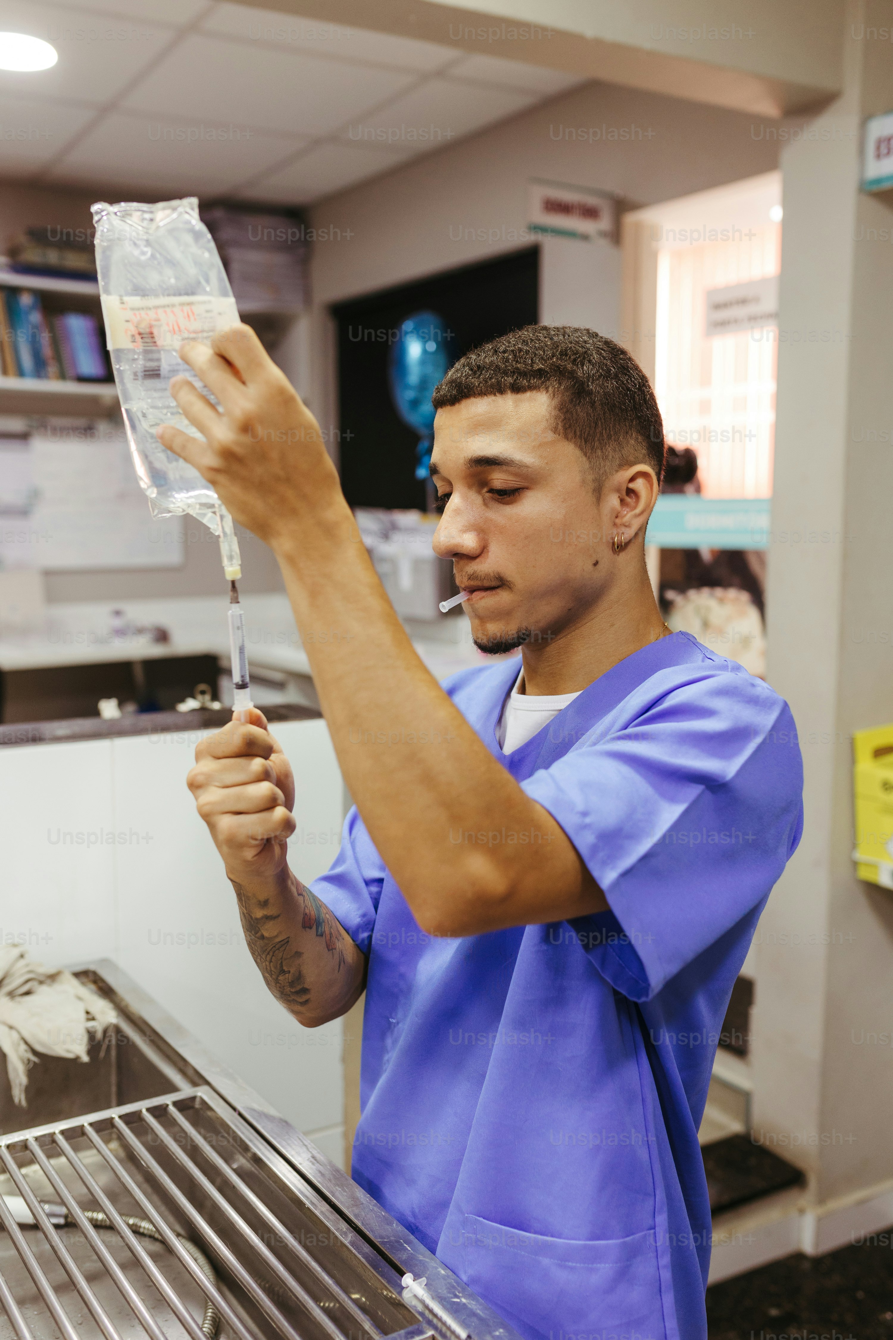 a male in a blue shirt and some food