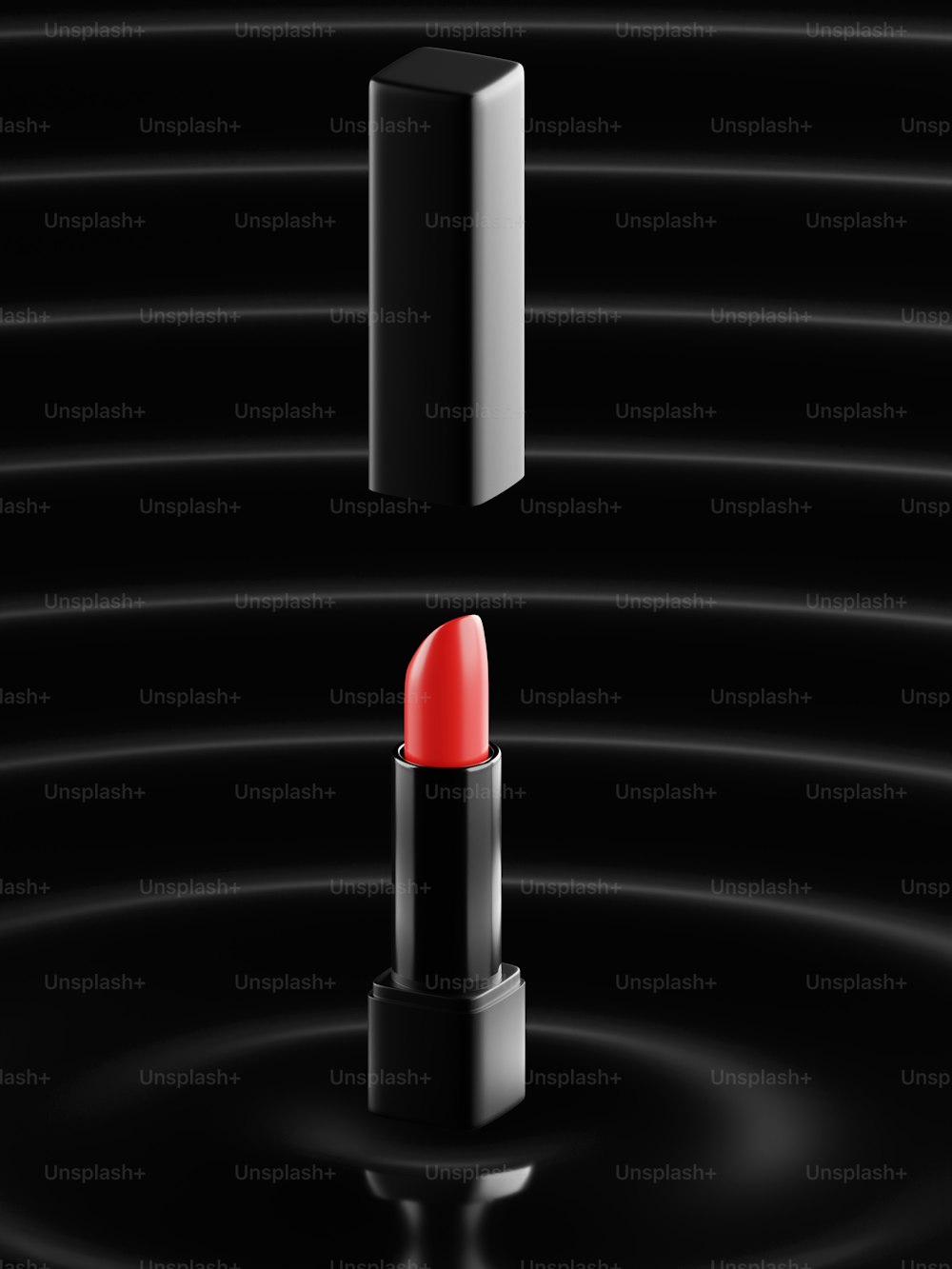un rouge à lèvres rouge posé sur une surface noire