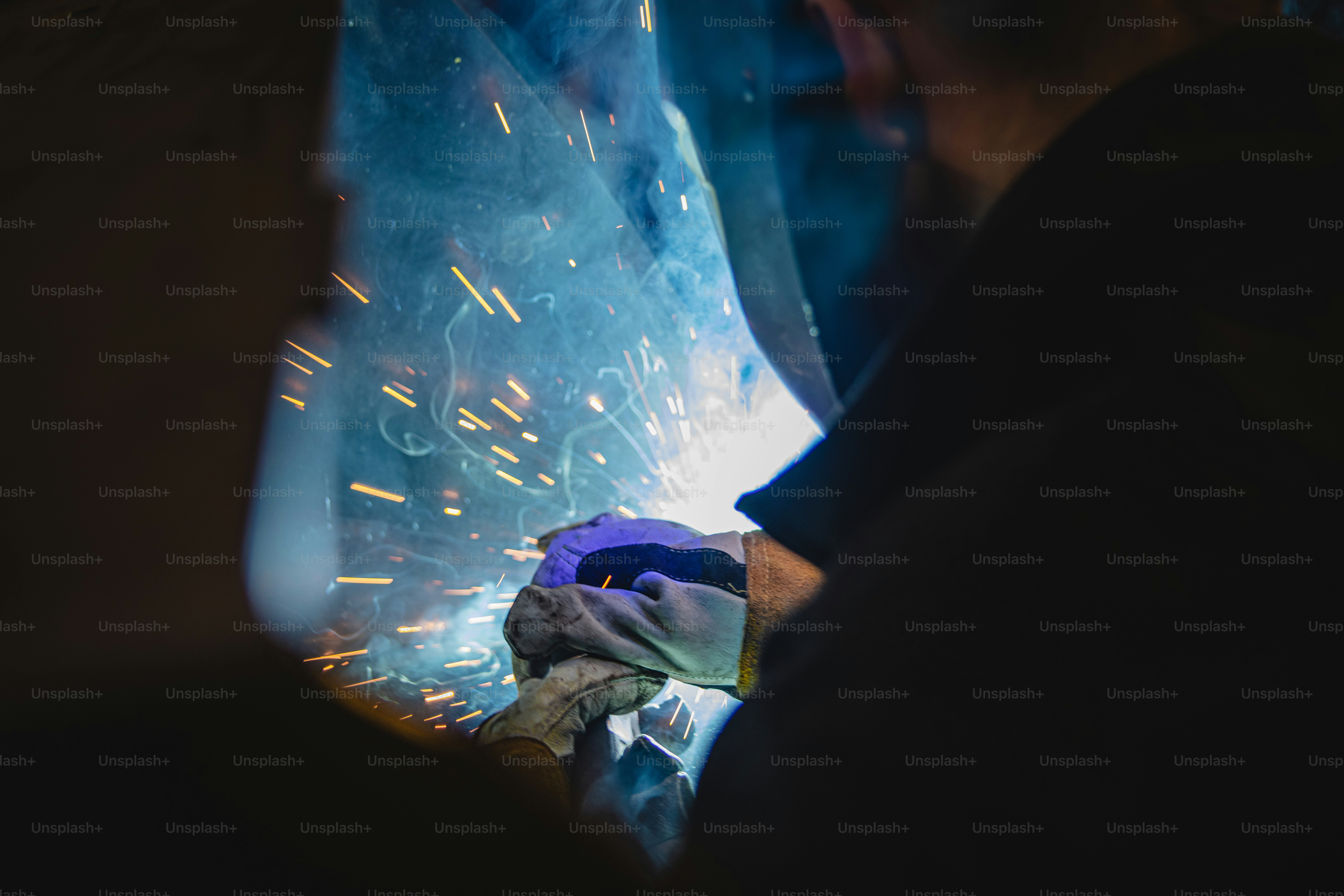 a welder working on a piece of metal