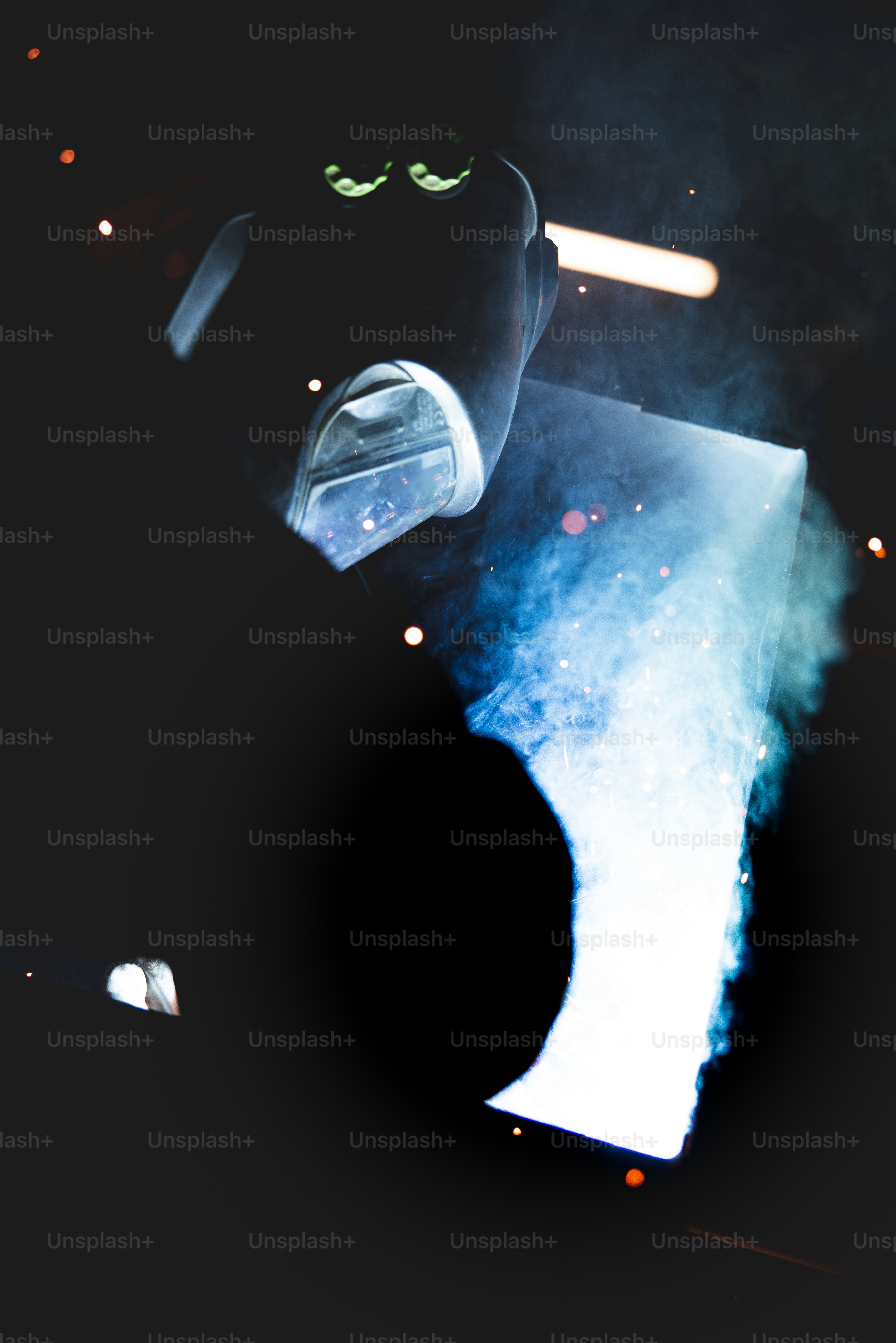 a close up of a person's face with a light on