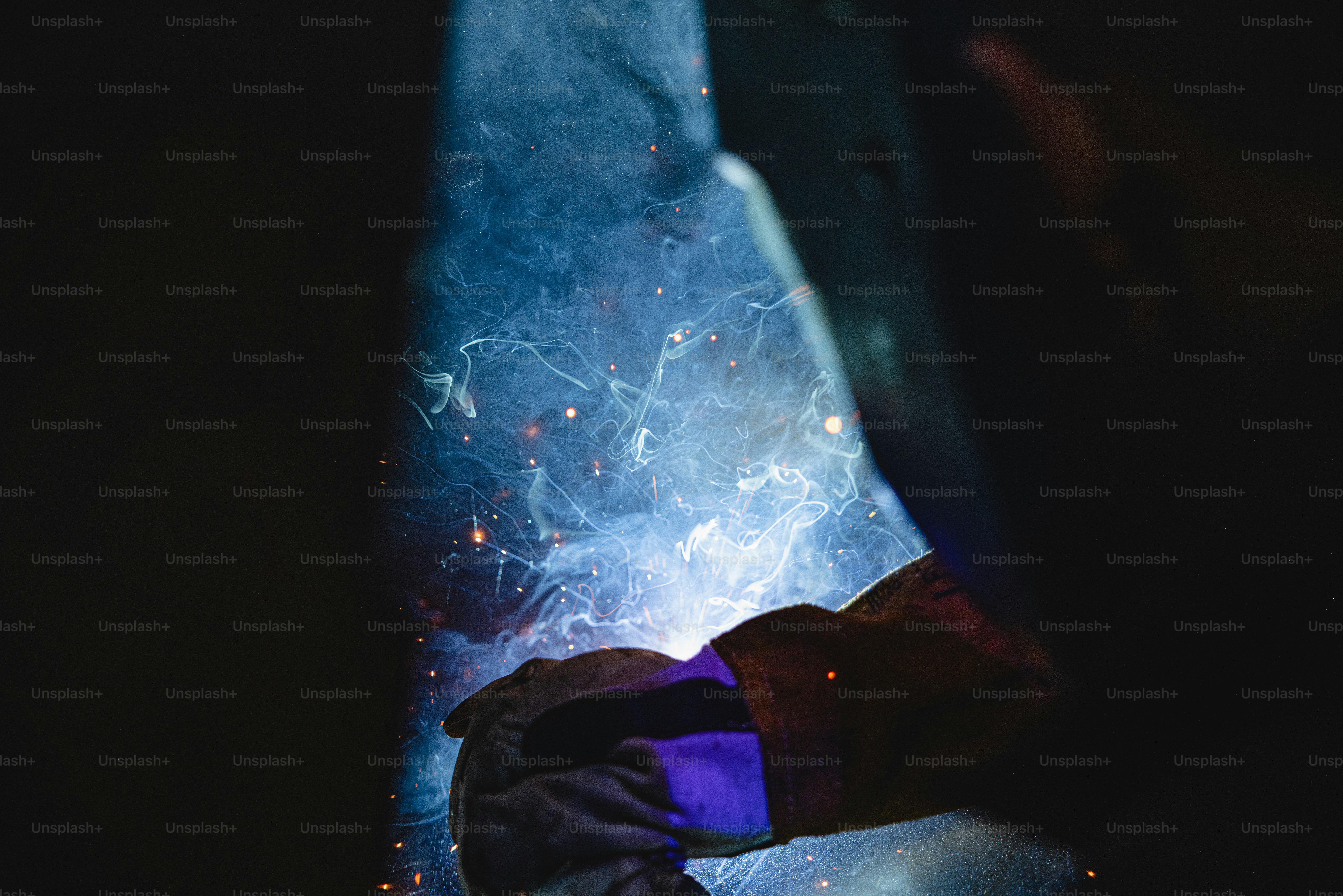 a welder working on a piece of metal