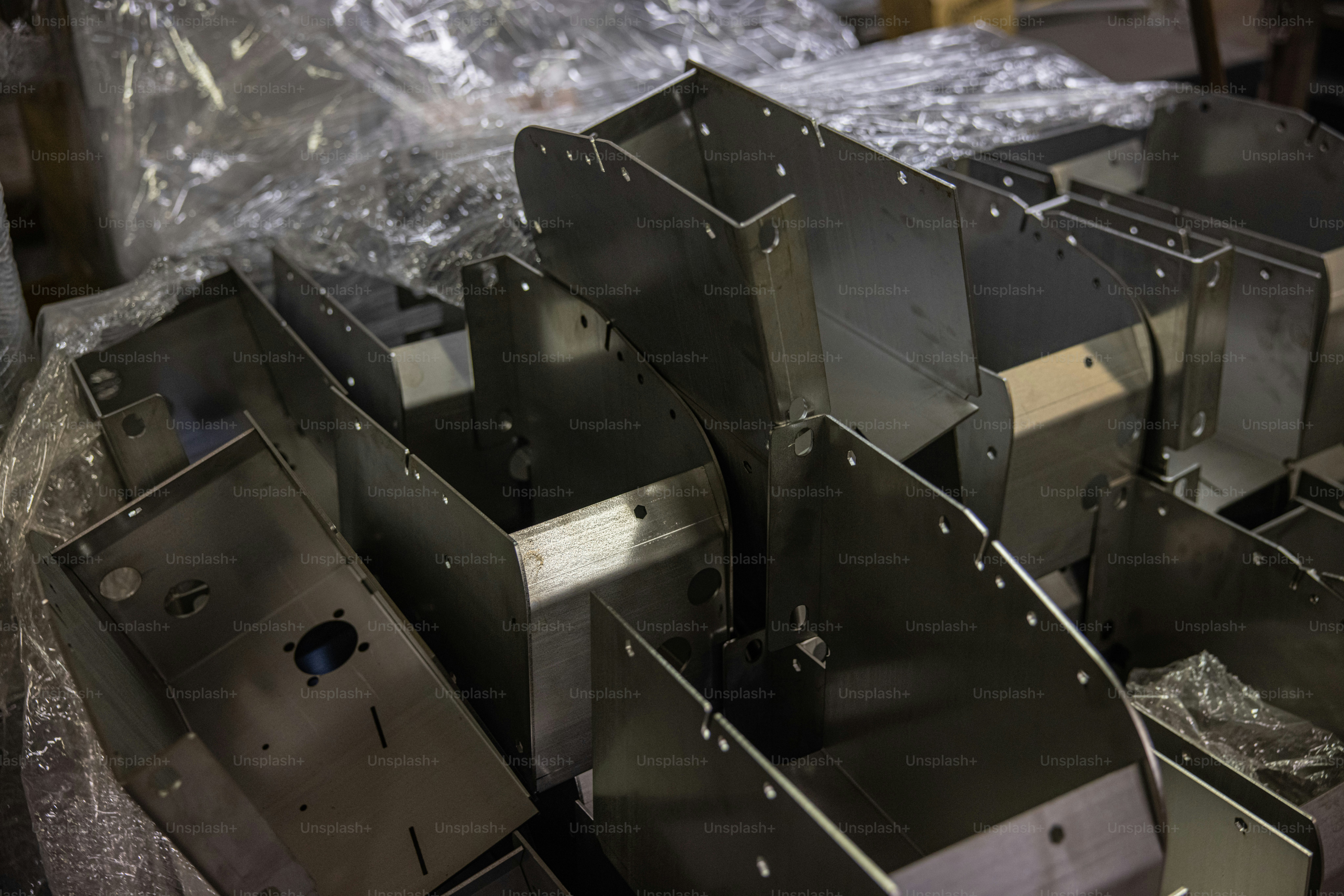 a group of metal boxes sitting on top of a table