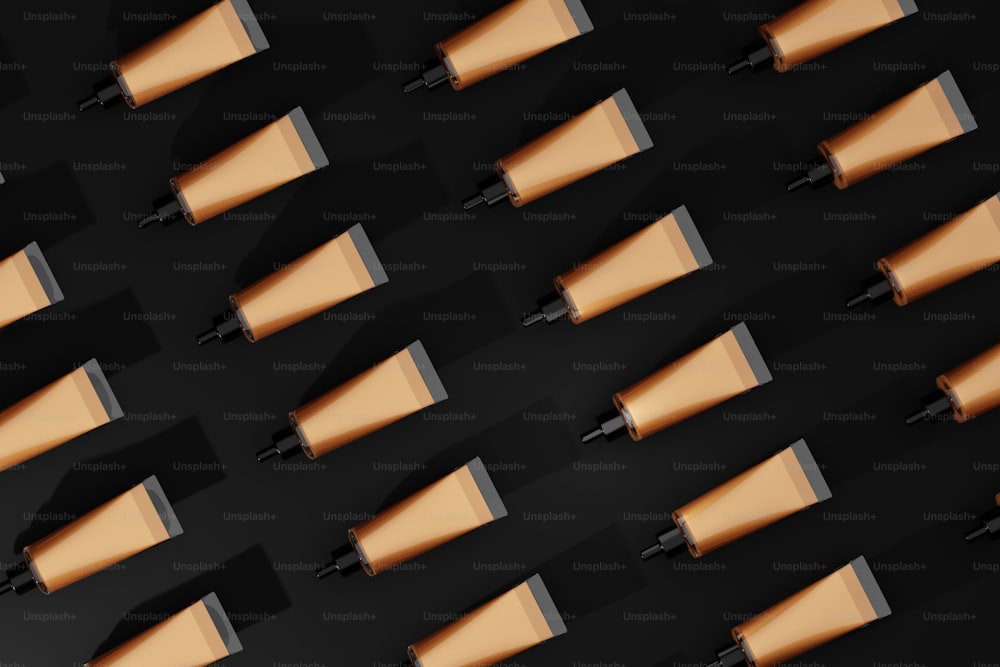 a black background with a lot of brown objects