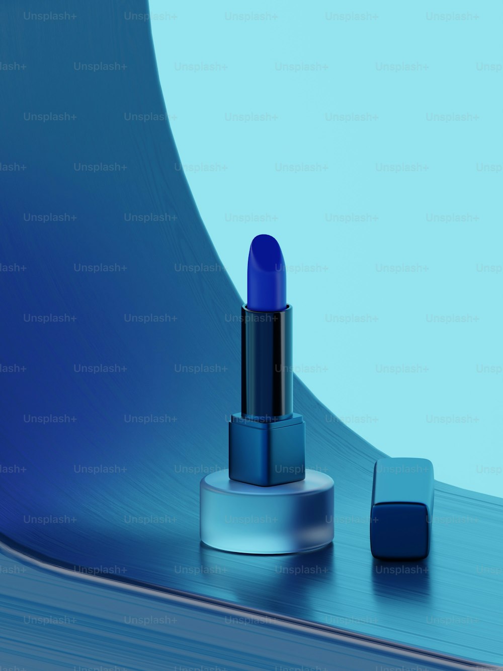 a blue lipstick sitting on top of a table
