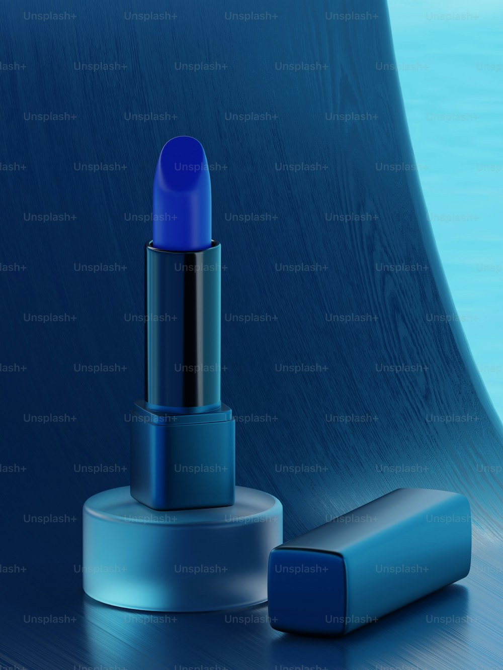 a blue lipstick sitting on top of a wooden table