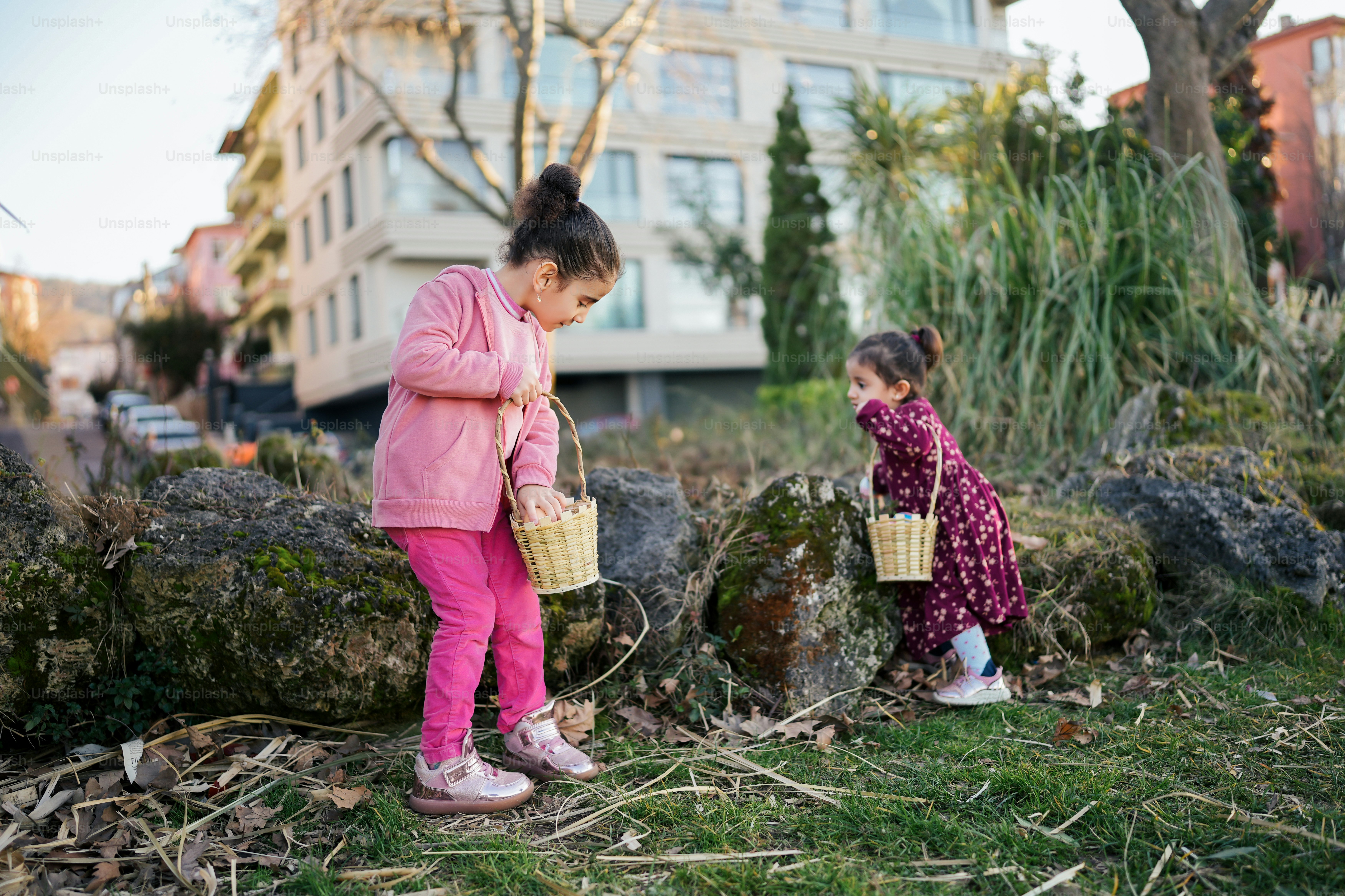 two little girls standing next to each other