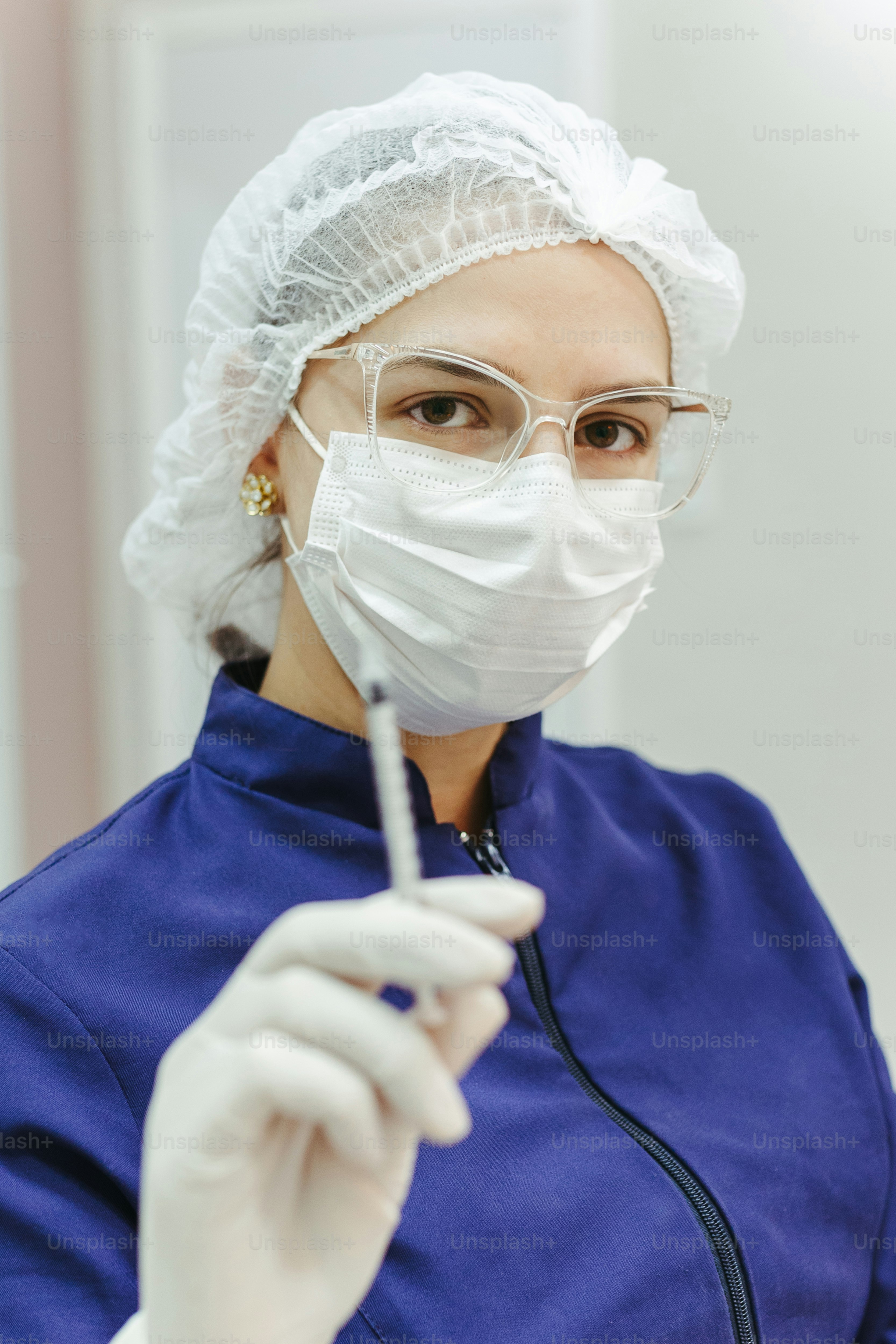 a woman wearing a mask and holding a toothbrush