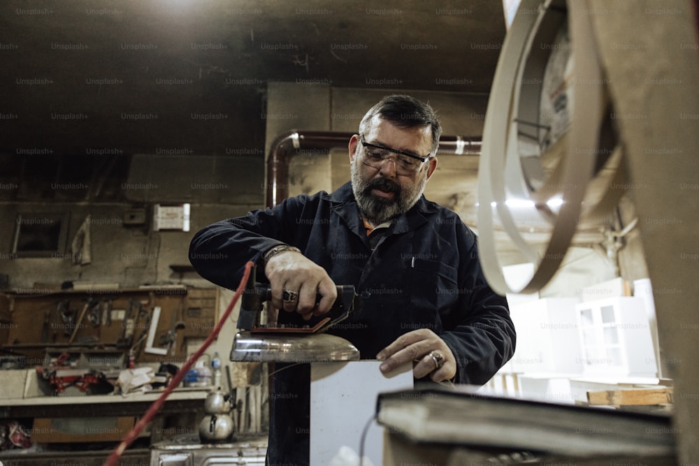 a man working on a piece of metal