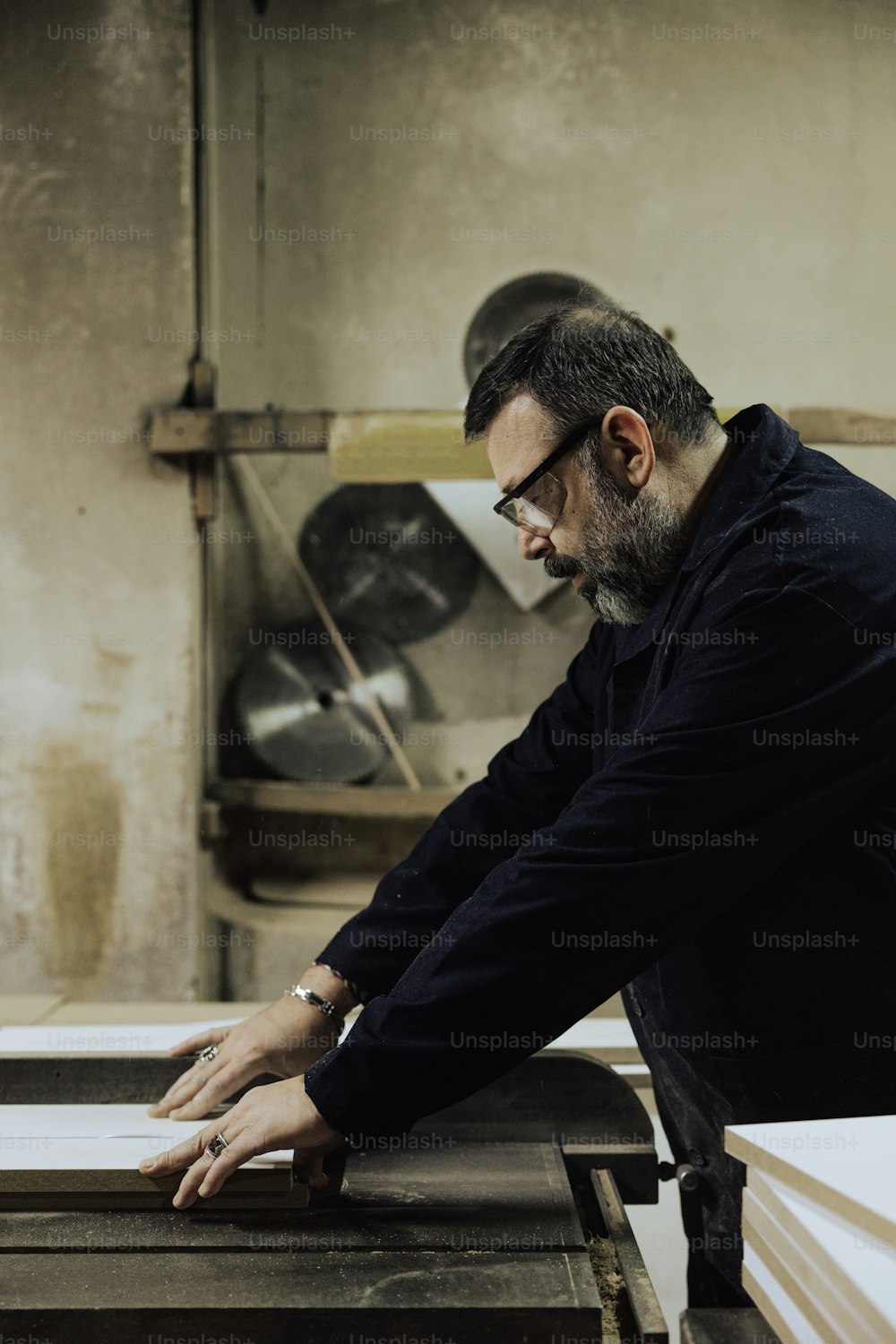 a man working on a piece of wood