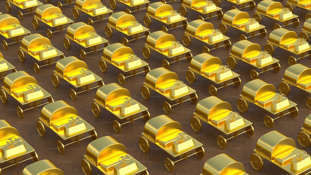 a large group of yellow toy cars in a parking lot