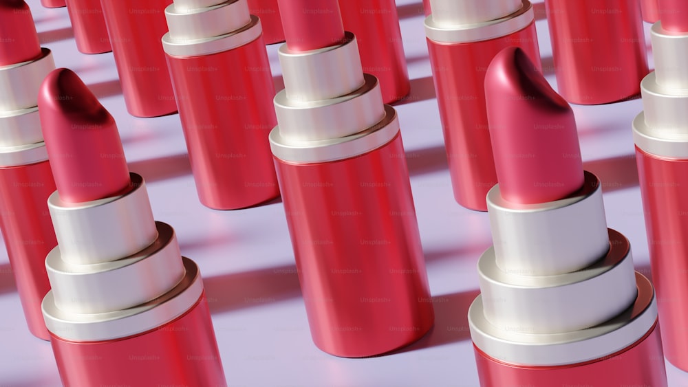 a group of red lipsticks sitting next to each other