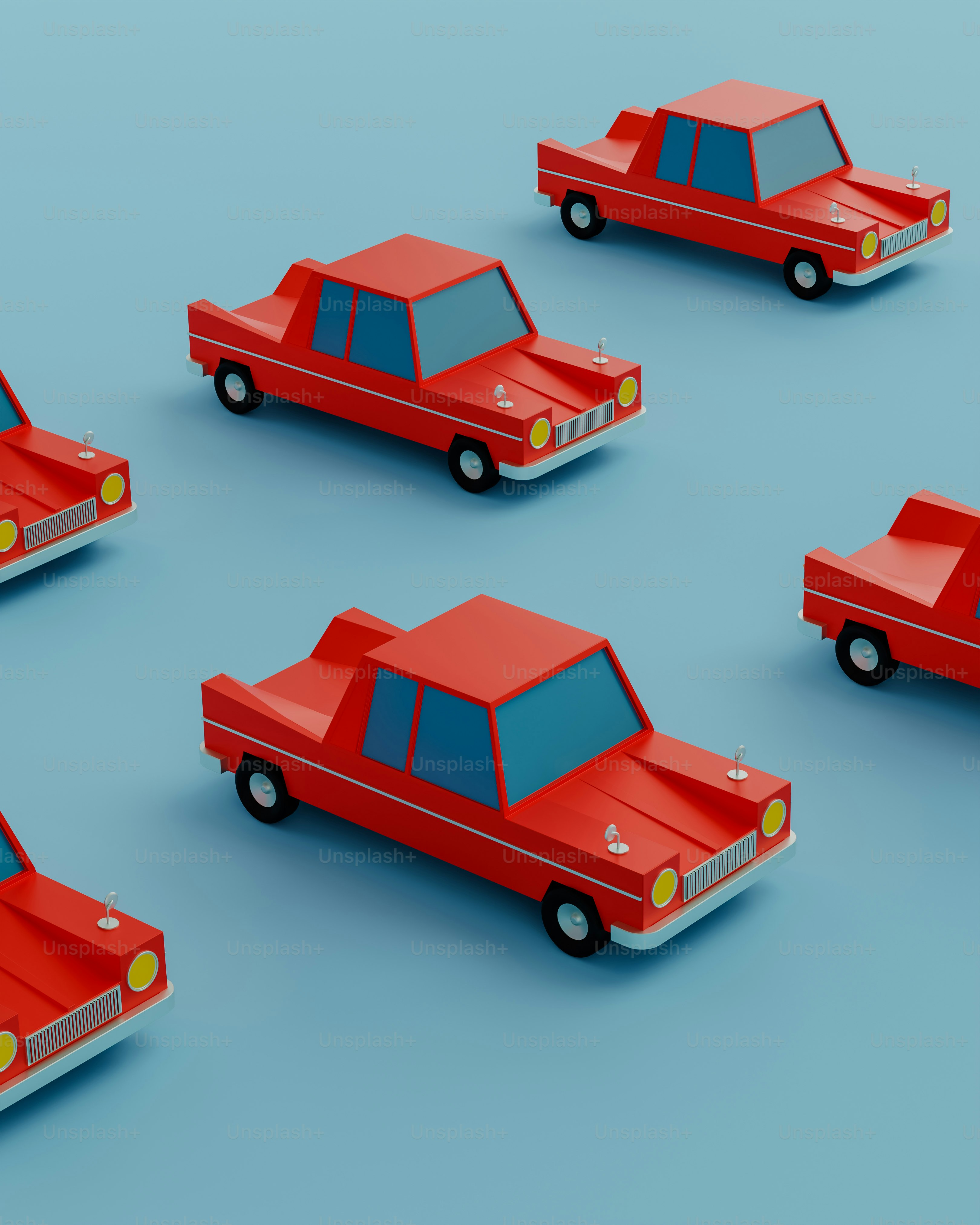 a group of red cars sitting next to each other