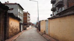 a narrow street with buildings on both sides