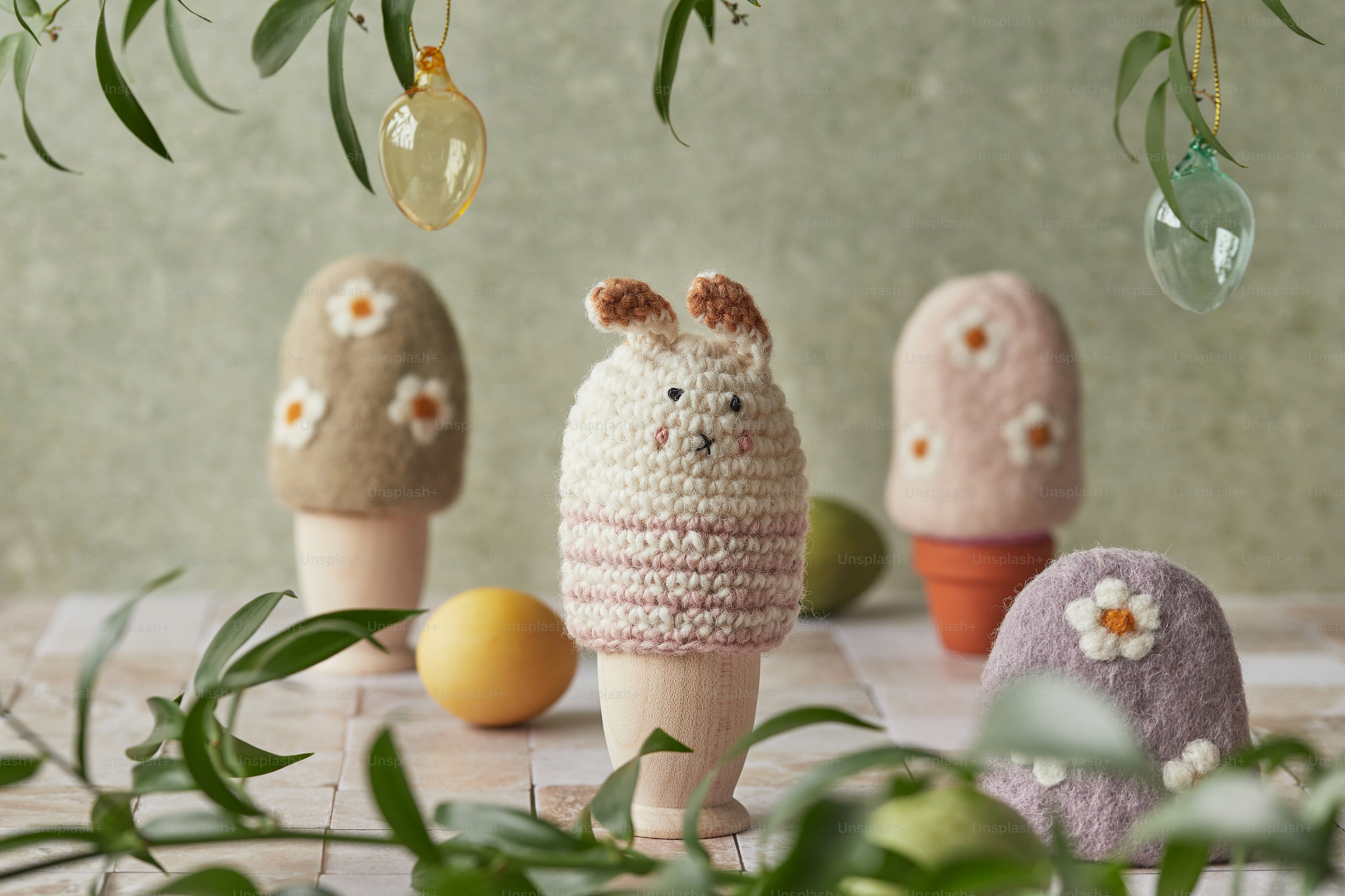 a group of small stuffed animals sitting on top of a table
