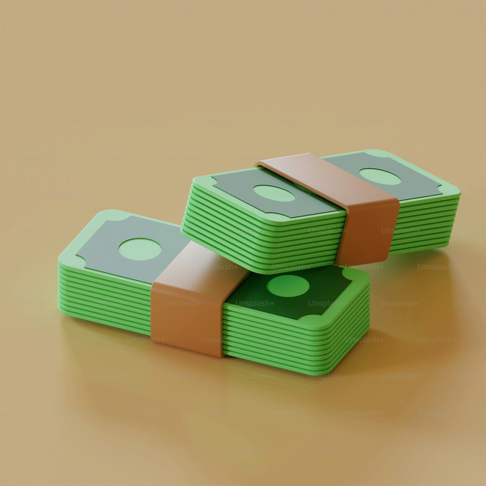 two stacks of money sitting on top of each other