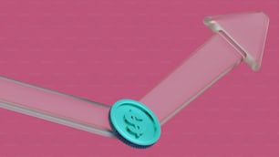 Un primer plano de un objeto metálico sobre un fondo rosa