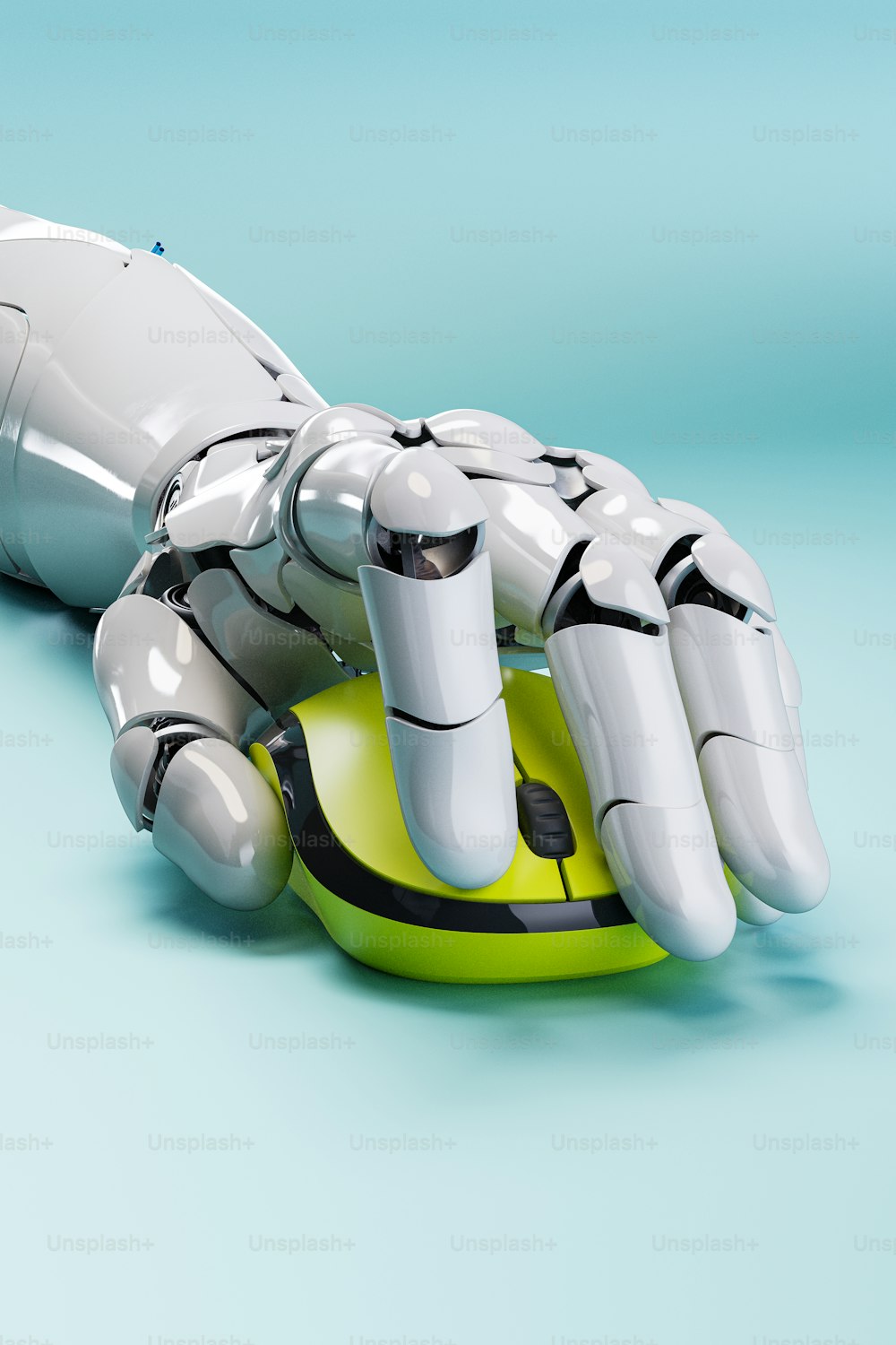 a robotic hand that is sitting on top of a green object