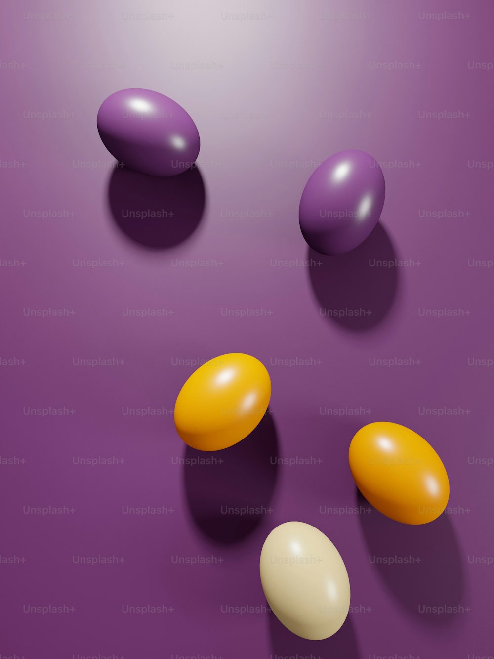 a group of eggs sitting on top of a purple surface