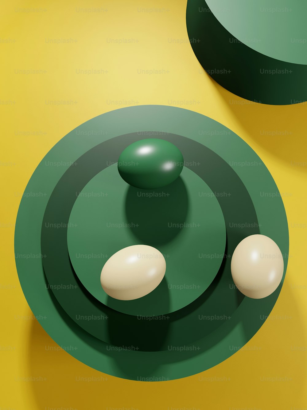 a green and white object on a yellow surface