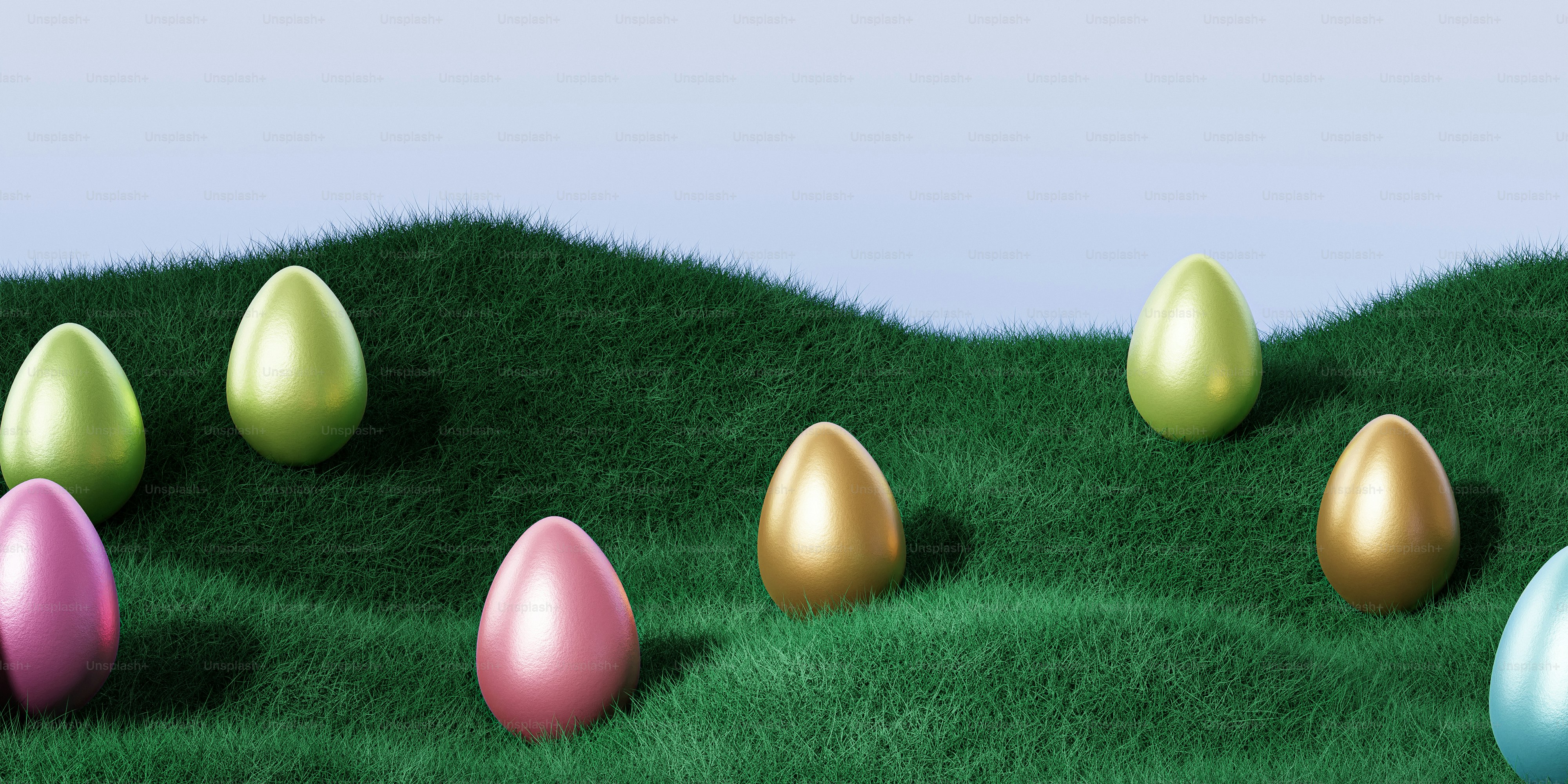a group of eggs sitting on top of a lush green field