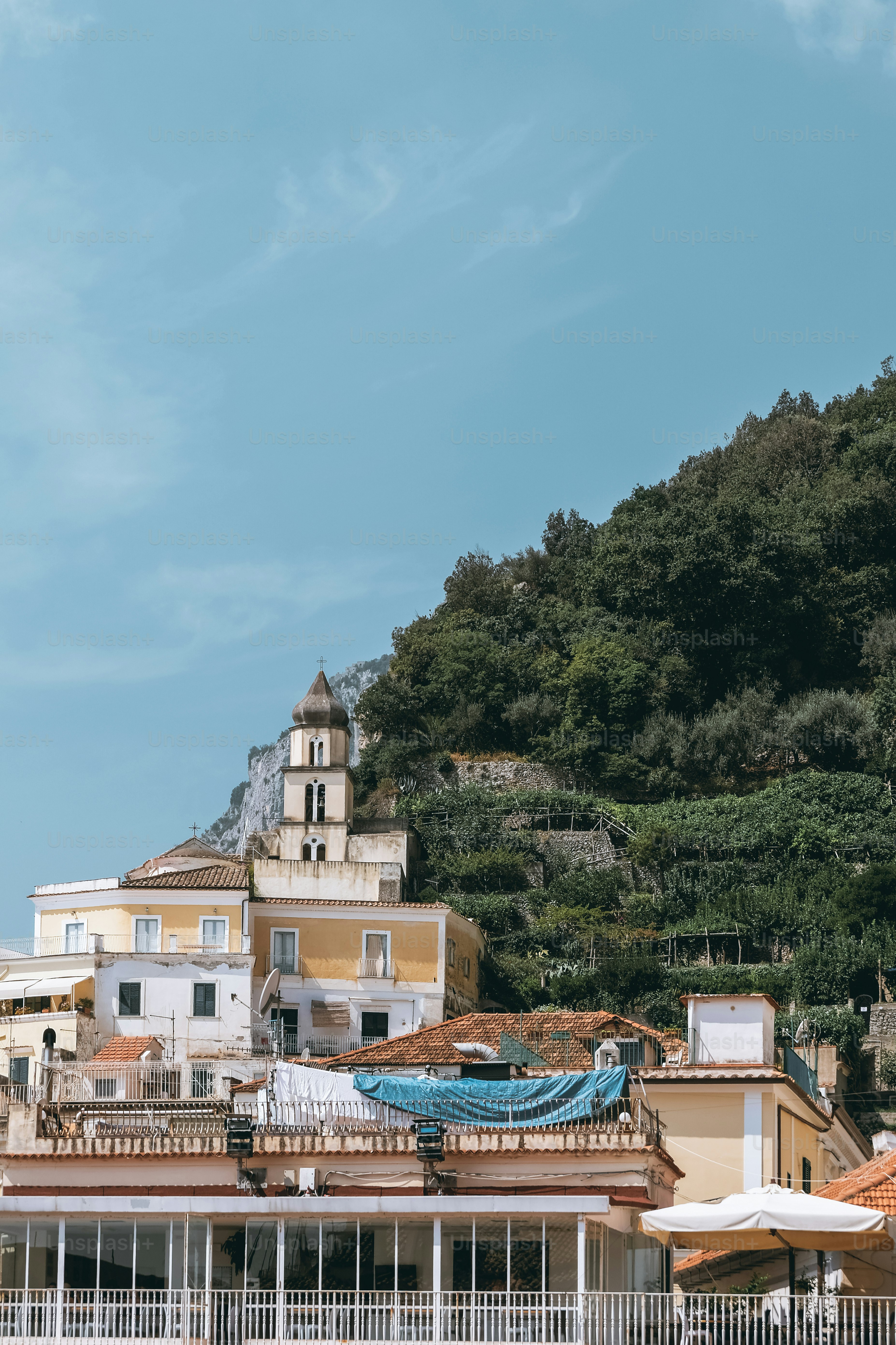 a view of a city with a hill in the background
