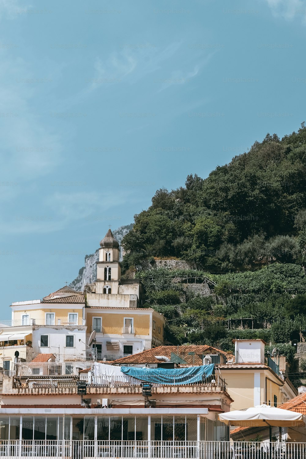 a view of a city with a hill in the background