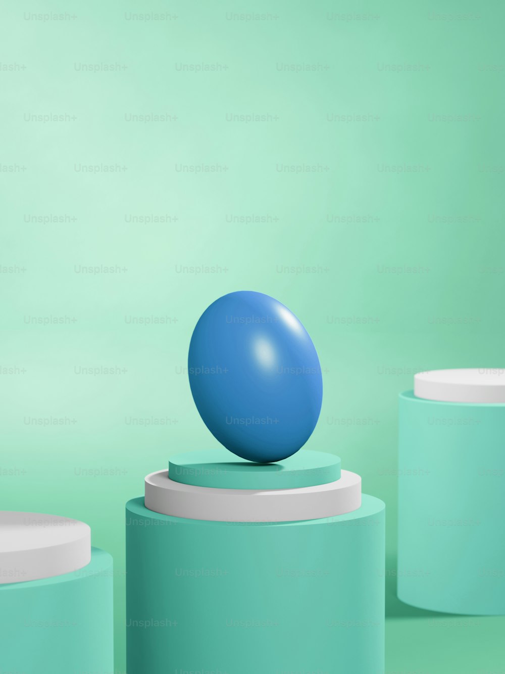 a blue ball sitting on top of a pedestal