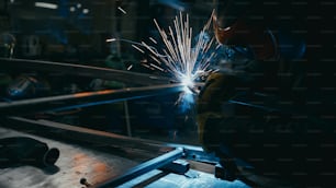 a welder working on a piece of metal