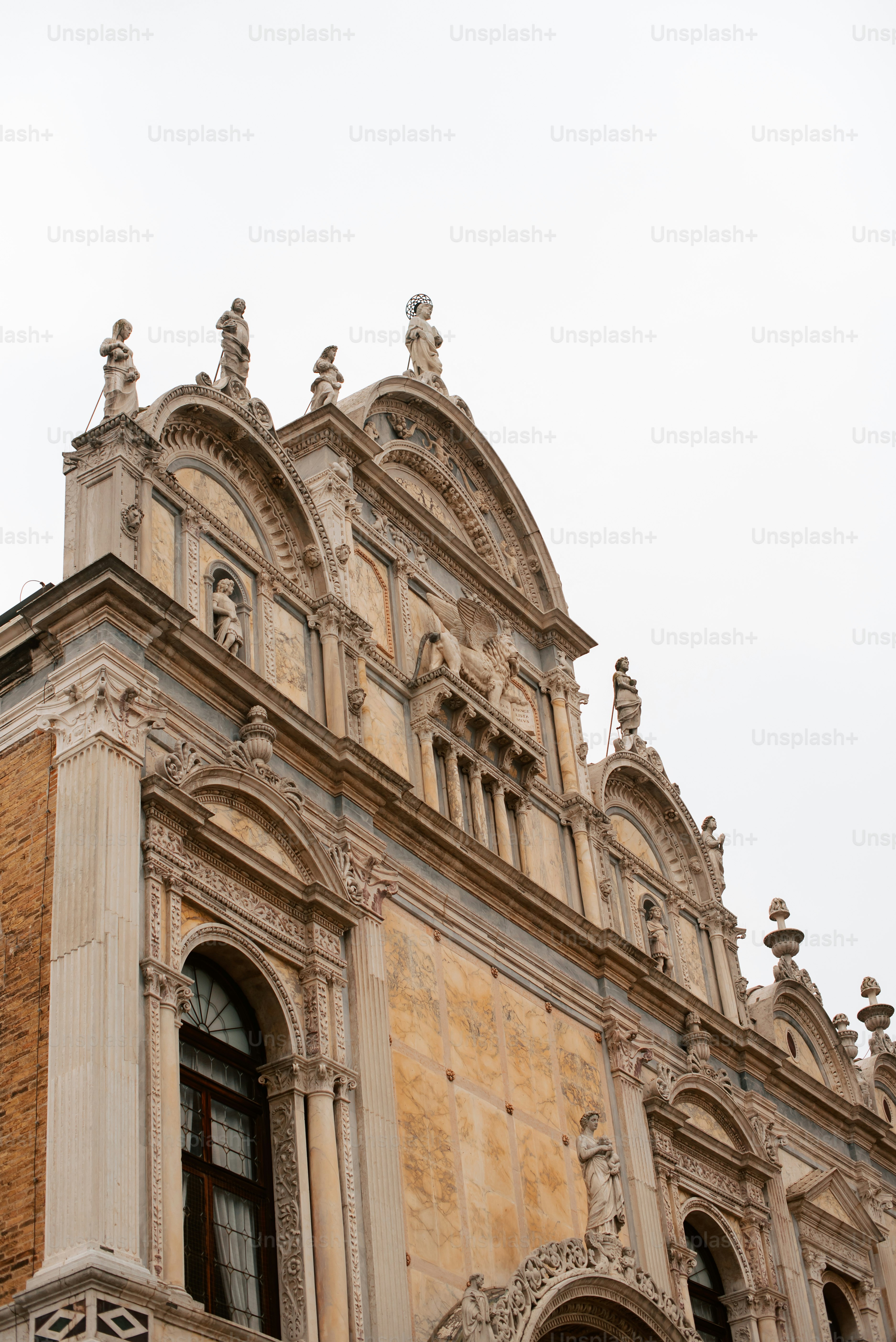 a tall building with a clock on the top of it