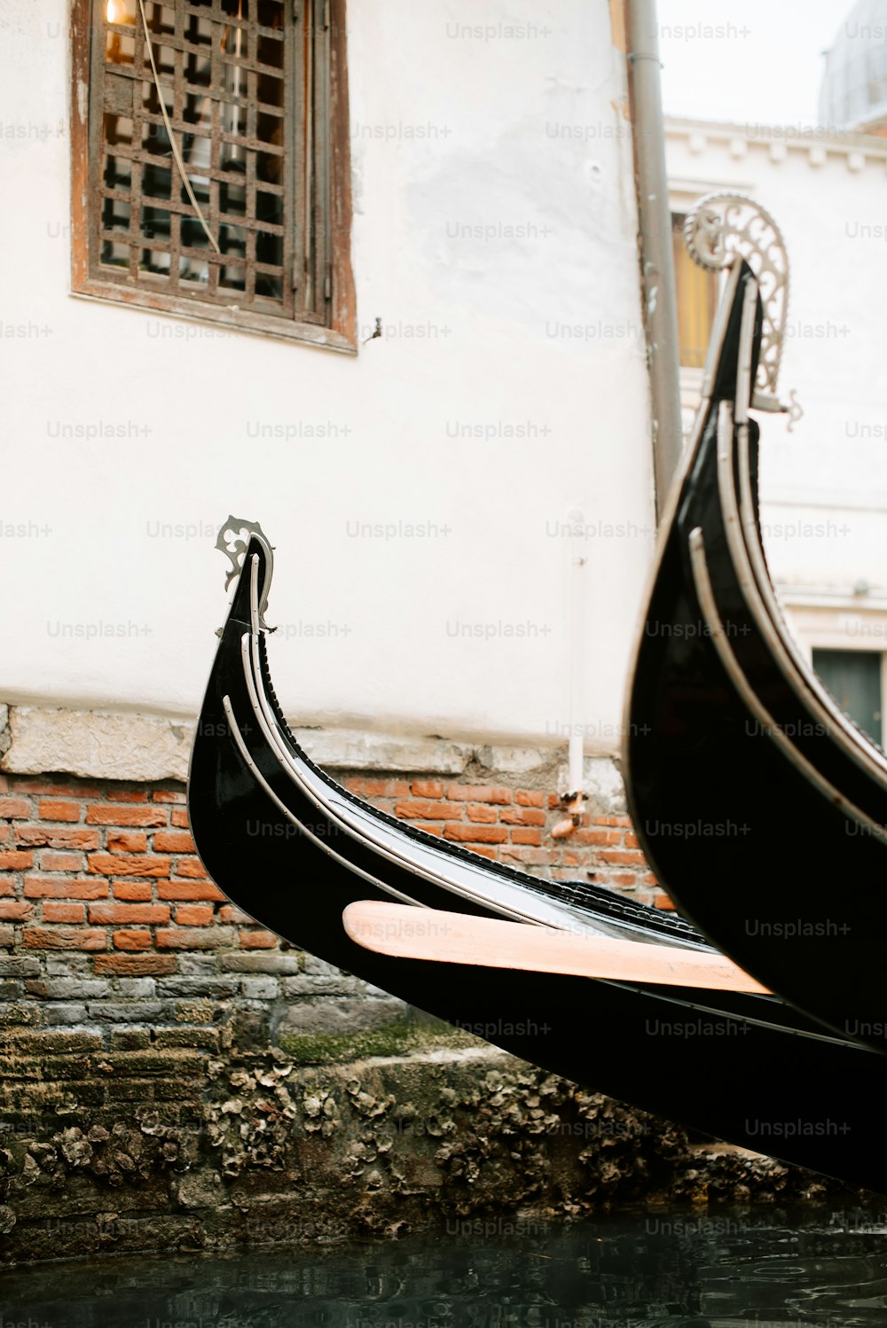 a gondola in front of a building with a window