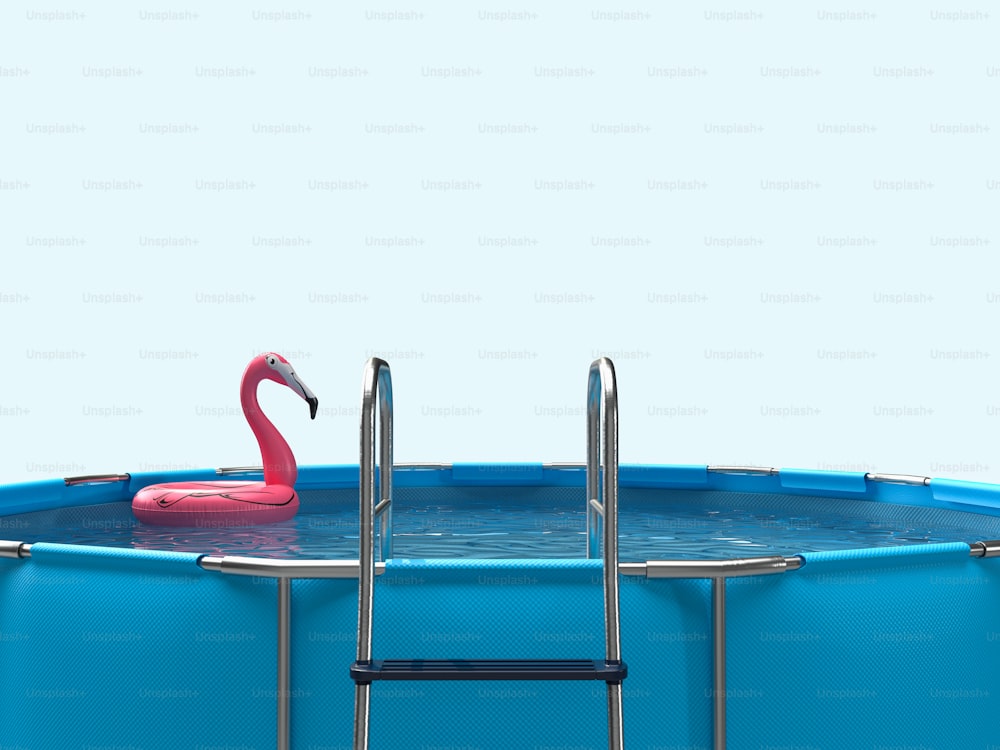 a pink flamingo sitting on top of a blue swimming pool