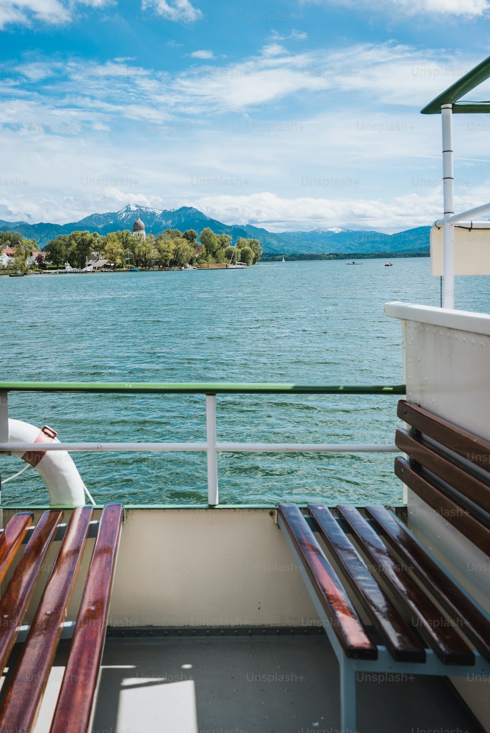 a couple of benches sitting on top of a boat