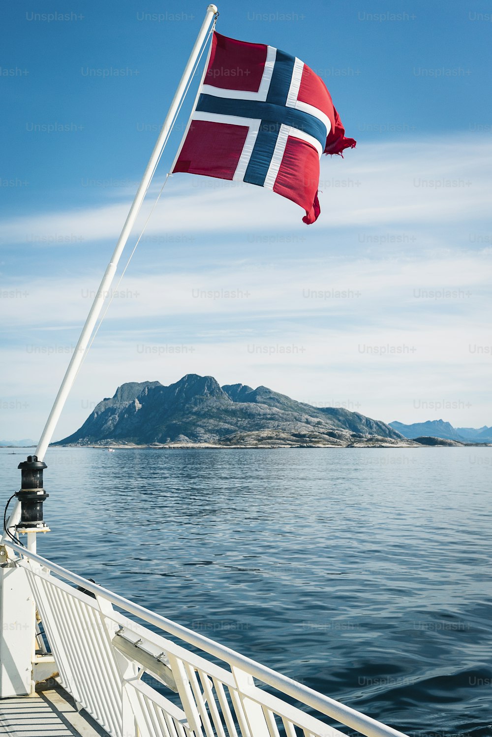 a flag on a boat in the water