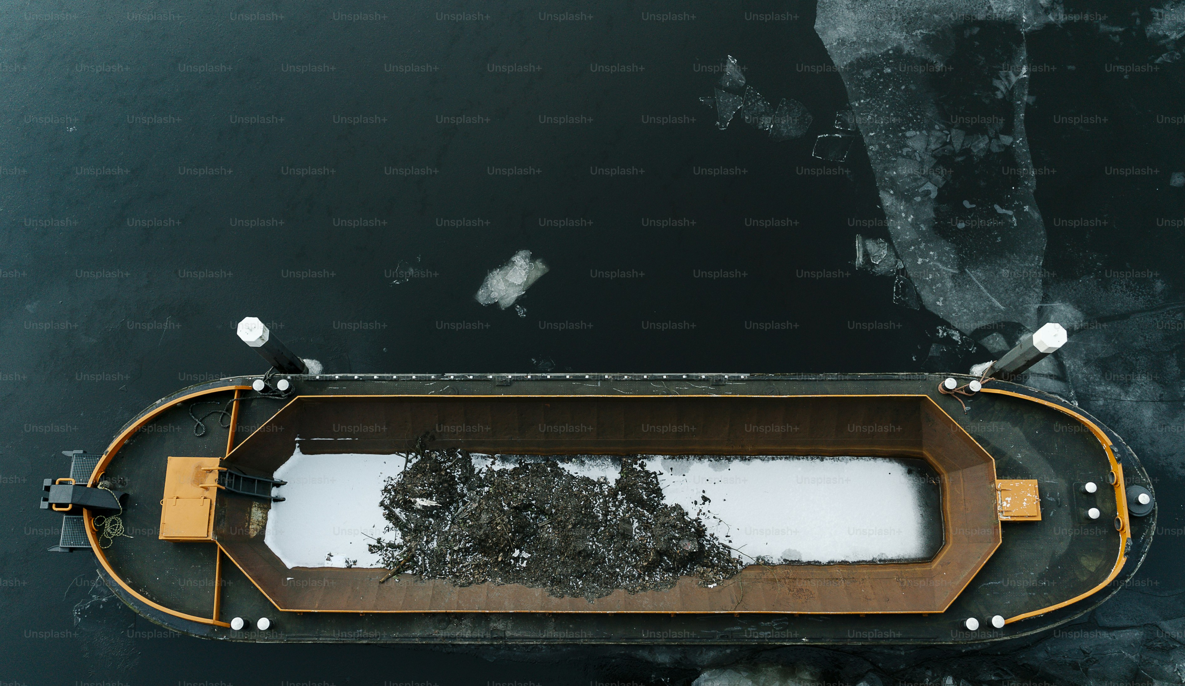 a boat with a lot of snow in it