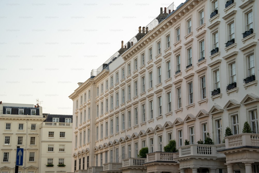 a row of white buildings next to each other