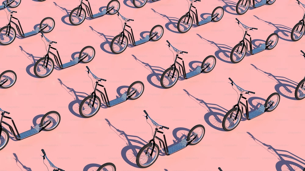 Un grande gruppo di biciclette sono disposte in uno schema