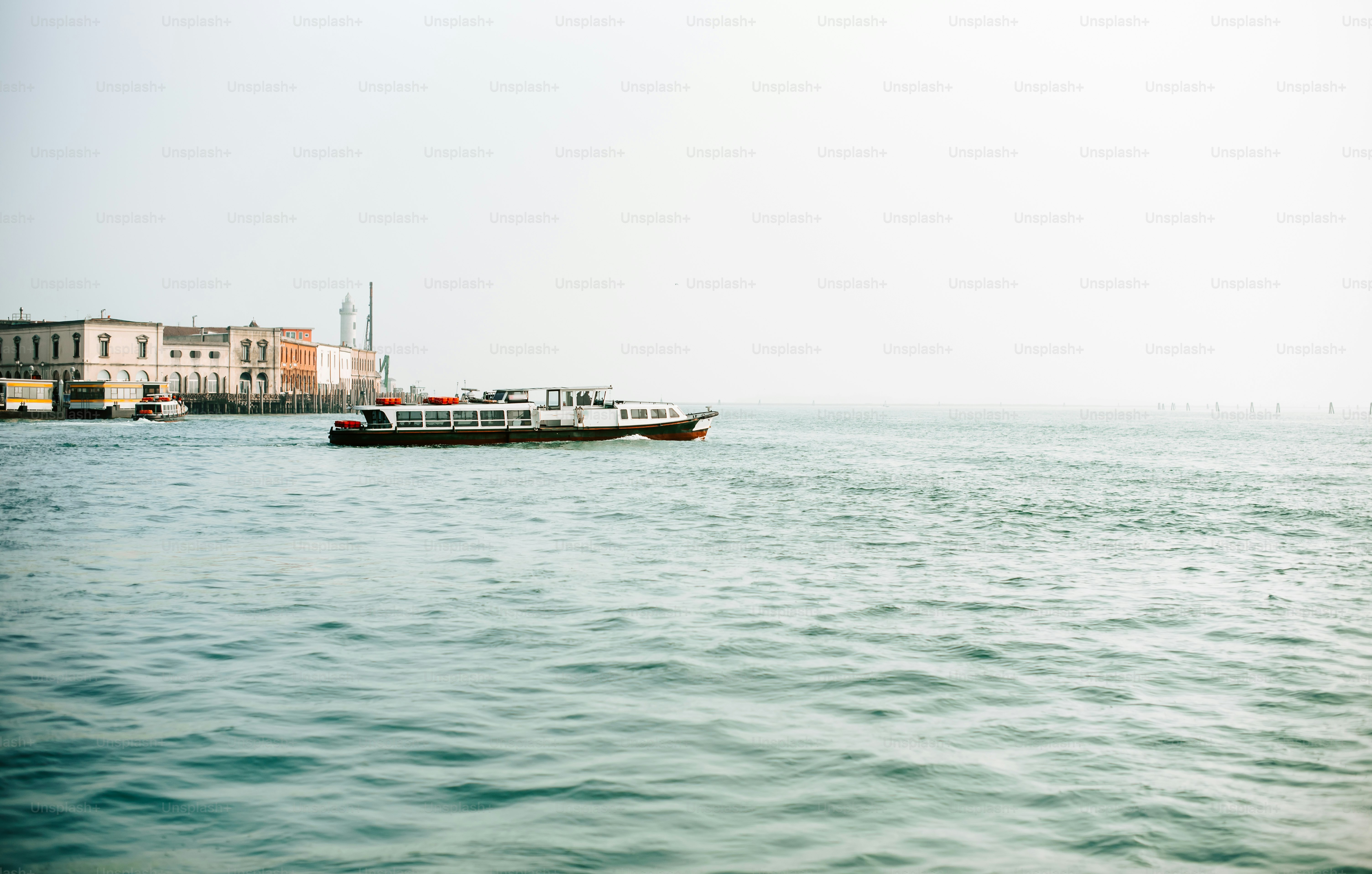 a boat floating on top of a large body of water