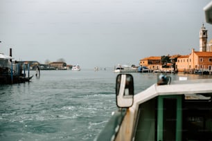 a boat traveling down a body of water