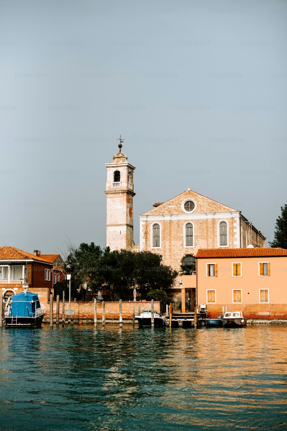 a church on the shore of a body of water